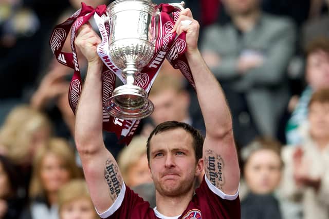 Andy Webster finally got his hands on the Scottish Cup with Hearts in 20212. Picture: SNS