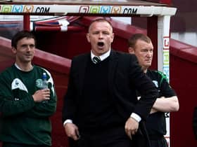 Then Hibs boss John Hughes went through all the emotions during the 6-6 game. Picture: SNS
