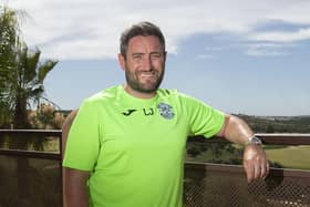 Lee Johnson takes time out from putting Hibs through their paces at the Amendoeira Golf Resort in the Algarve