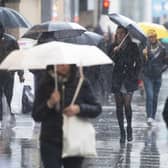 Shoppers hit the high street last month leading to a modest rise in sales but the outlook for consumer spending remains stormy.