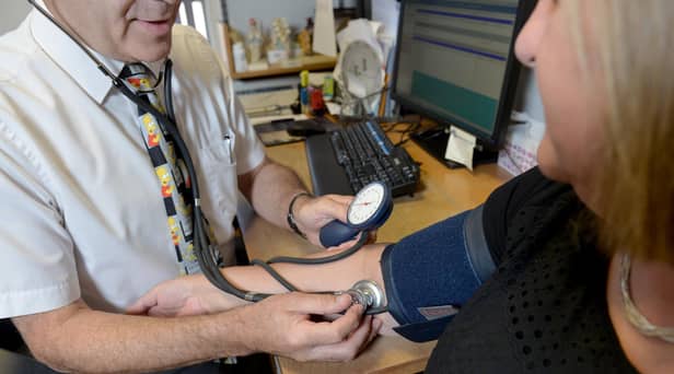The Scottish Government’s ‘Settling In’ campaign, urges people to contact their GP practice if they have unusual breathlessness or a new or different persistent cough for more than three weeks. Photo: PA.