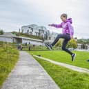 Connie Rutherford, 12 and Edward Renwick 10 do Parkour in Holyrood Park.