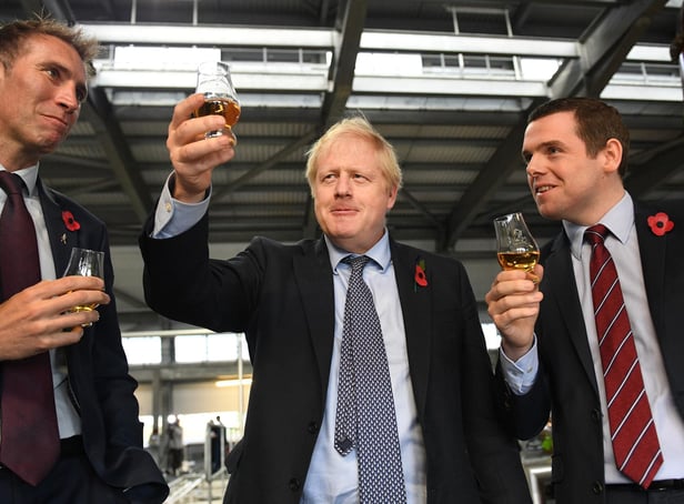 Boris Johnson and Douglas Ross are reasons why the Scottish Conservative will lose seats at the Scottish Parliament election, says Angus Robertson (Picture: Stefan Rousseau/PA)