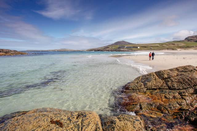 Walking along a deserted beach - like Tangasdale Beach on the Isle of Barra (pictured) - was the most popular choice for how to unwind on a holiday in Scotland. (Image: VisitScotland/Paul Tomkins)