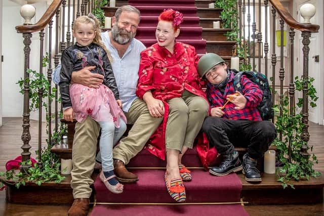 Dick and Angel Strawbridge, stars of Escape to the Chateau, and their children.