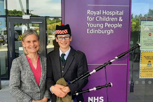 Dr Laura Young MBE and William Cuthill outside the Royal Hospital for Children and Young People in Edinburgh.