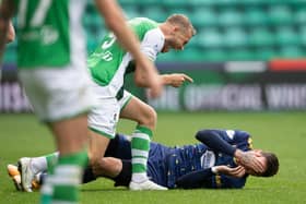 Ryan Porteous makes his feelings known to Kyle Lafferty after the duo clashed in the second half at Easter Road
