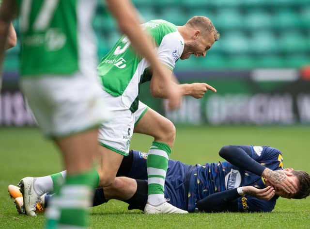 Ryan Porteous makes his feelings known to Kyle Lafferty after the duo clashed in the second half at Easter Road