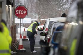 Members of the vaccination team working at the drive-through Covid-19 vaccination centre in the Queen Margaret University Campus, Musselburgh. Picture: PA Media