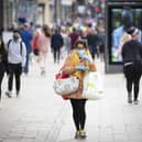 A shopper wears a protective face mask in Edinburgh's Princes Street earlier this year