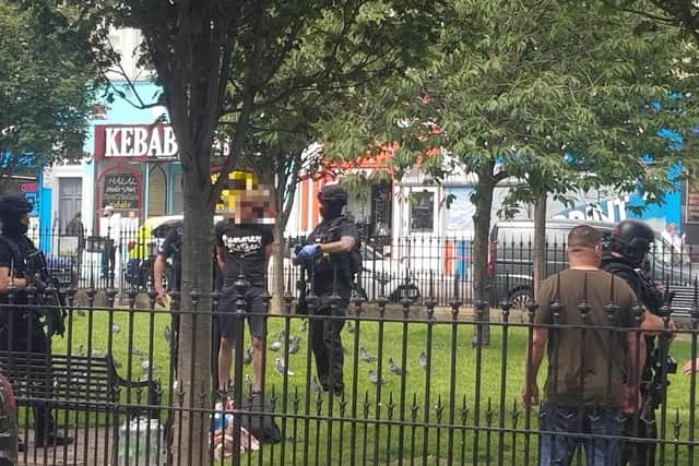 Armed officers attended the scene this afternoon