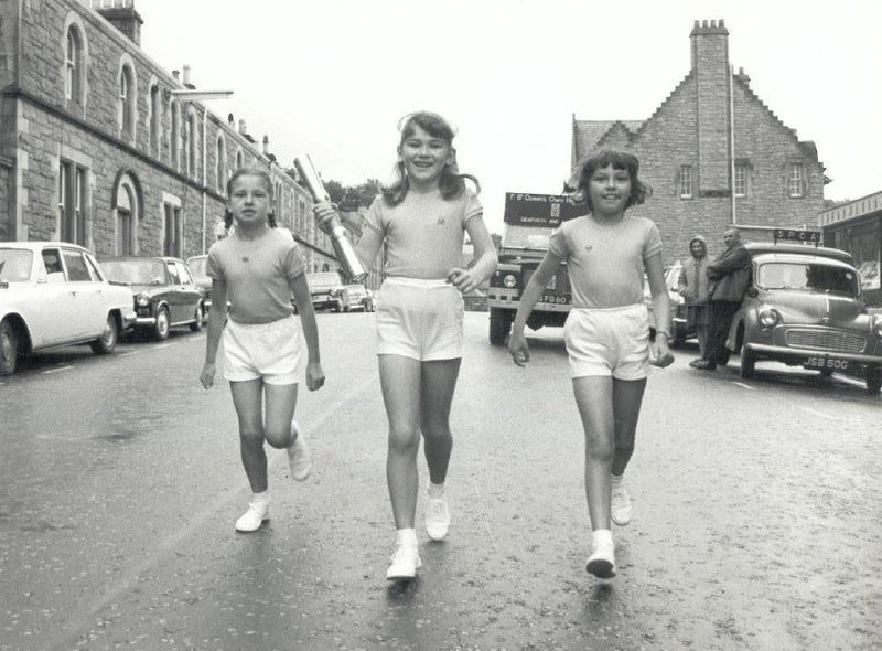 Three youngsters take part in the 1970 Queen's Baton Relay in the runup to the Edinburgh Games.