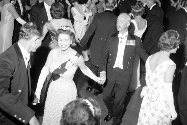 Queen Elizabeth II dances an eightsome reel at the Royal Company of Archers' Ball in the Assembly Rooms, Edinburgh, in 1966