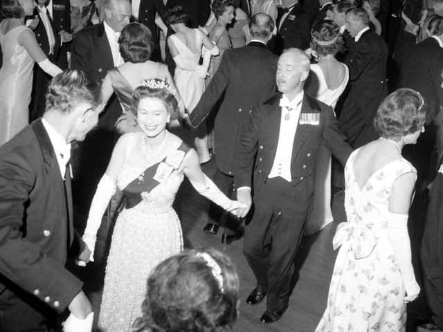 Queen Elizabeth II dances an eightsome reel at the Royal Company of Archers' Ball in the Assembly Rooms, Edinburgh, in 1966