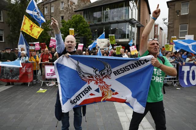 Protesters demonstrate outside the Conservative leadership hustings in Perth earlier this month (Picture: Jeff J Mitchell/Getty Images)
