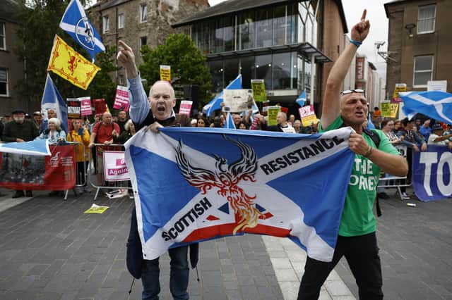 Protesters demonstrate outside the Conservative leadership hustings in Perth earlier this month (Picture: Jeff J Mitchell/Getty Images)