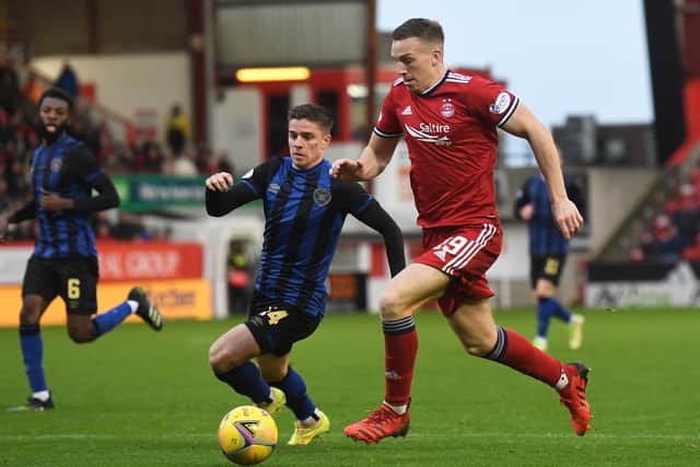 Hearts' Cammy Devlin tracks Aberdeen's Lewis Ferguson during the weekend defeat at Pittodrie. (Photo by Craig Foy / SNS Group)
