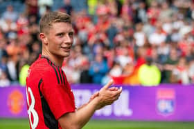 Will Fish applauds the fans after Manchester United's friendly against Lyon at Murrayfield. Picture: Ash Donelon/Manchester United via Getty Images