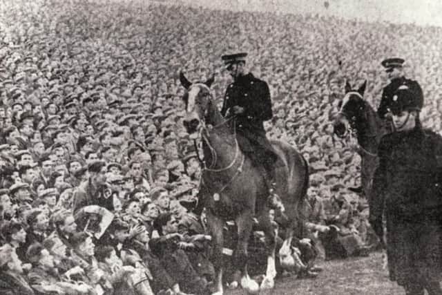 Mounted police were brought in to maintain order among the record crowd