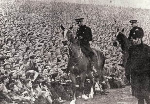 Mounted police were brought in to maintain order among the record crowd