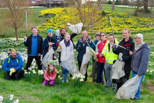 Members of the Friends of St Katharine’s Park take part in a clean-up