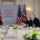 American voters had the good sense to ditch Donald Trump but Boris Johnson remains UK Prime Minister (Picture: Dylan Martinez/pool/Getty Images)