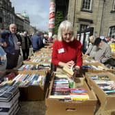 Book buyers browse some of the many volumes on offer at the book sale which has a vast range inside and out.  Photo: Colin Hattersley.