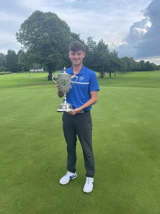 Longniddry's James Morgan shows off the Cameron Corbett Vase after his latest 72-hole triumph at Haggs Castle.