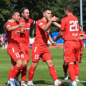 Bonnyrigg Rose players celebrate kevin Smith's first-half equaliser. they came back again in injury time to snatch a point. Picture: Joe Gilhooley LRPS