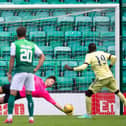 Kevin Dabrowski saves Pepe's penalty to preserve Hibs' 2-0 lead over Arsenal. (Photo by Ross Parker / SNS Group)