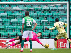 Kevin Dabrowski saves Pepe's penalty to preserve Hibs' 2-0 lead over Arsenal. (Photo by Ross Parker / SNS Group)
