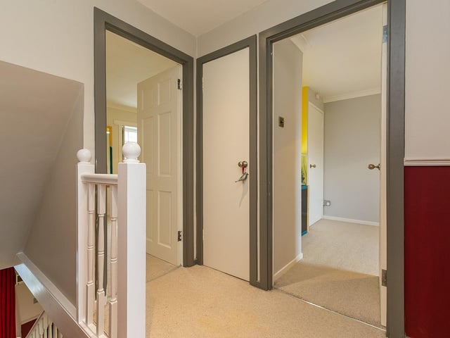 The two bedrooms and the bathroom are on the first floor.