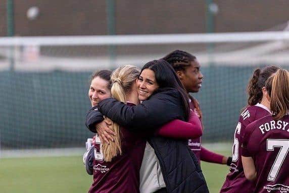 Eva Olid embracing captain Georgia Hunter. Credit: Hearts Women Twitter
