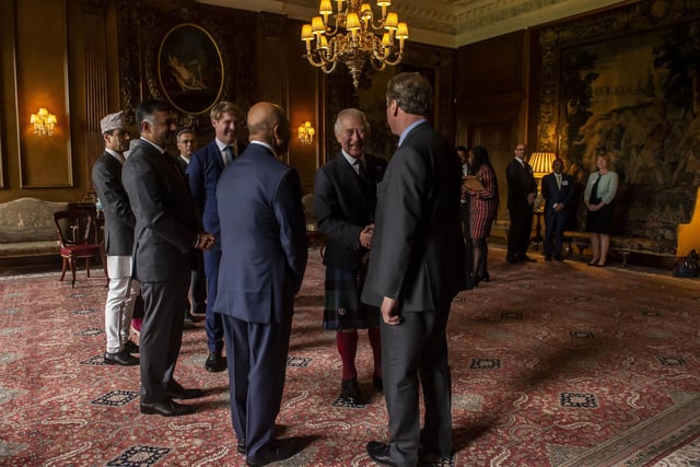 The King chats with Alister Jack,  Secretary of State for Scotland.