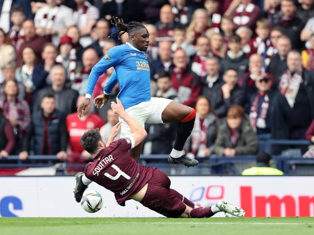 Rangers' Calvin Bassey (right) and Hearts' Stephen Kingsley battle for the ball during the Scottish Cup final