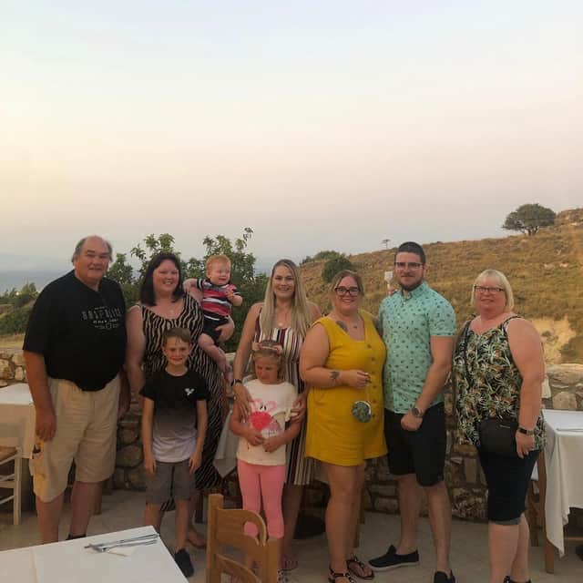 Father-of-three Ian Robertson on holiday with family in Kos, Greece, shortly before the accident.