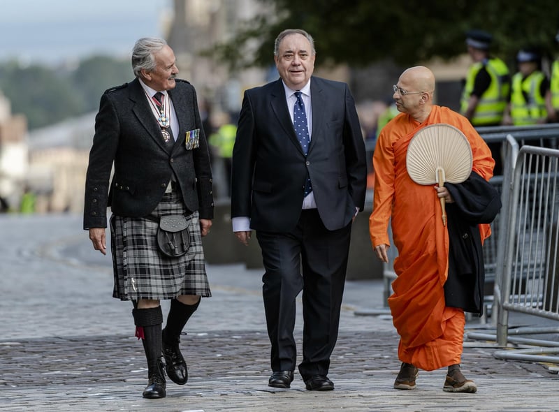 Former First Minister Alex Salmond (right) arrives at St Giles' Cathedral, Edinburgh for a Service of Prayer and Reflection for Queen Elizabeth II.