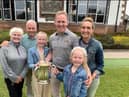 David Miller celebrates with his family after winning the Royal Burgess championship for the first time