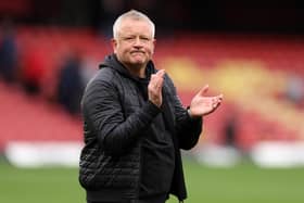 Outgoing Watford manager Chris Wilder applauds the fans at the end of the last Sky Bet Championship game of the season