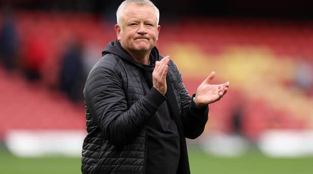 Outgoing Watford manager Chris Wilder applauds the fans at the end of the last Sky Bet Championship game of the season