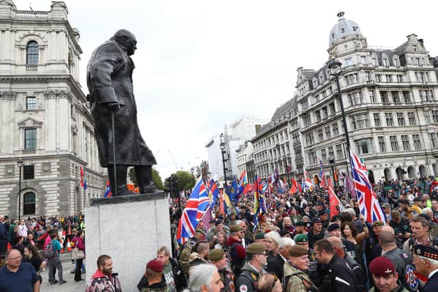 Demonstrators  gathered in Parliament Square in London as part of a 'Rolling Thunder' protest in support of Soldier F who was being prosecuted for the murder of two men, James Wray and William McKinney, shot during a civil rights demonstration in Londonderry on Bloody Sunday in 1972. (Photo: Aaron Chown/PA Wire).