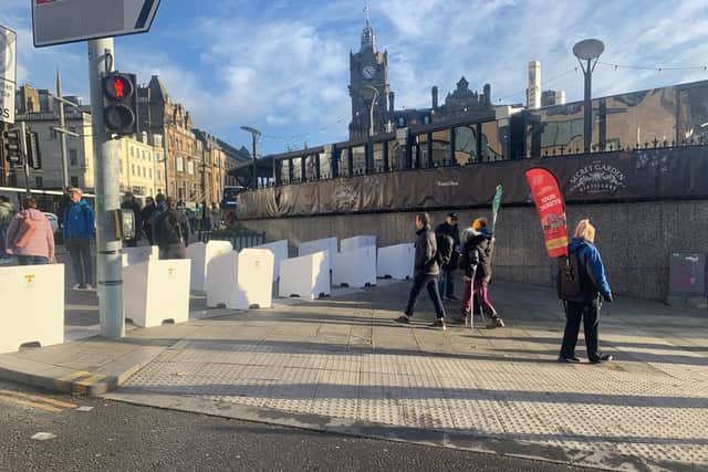 The mysterious boxes - and a ticket seller on Waverley Bridge
