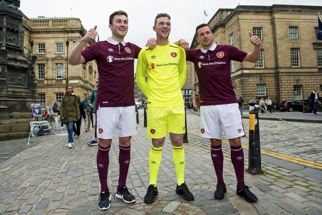 Modelled by John Souttar, Jack Hamilton, and Don Cowie on Edinburgh's Royal Mile. The trio are standing on the Heart of Midlothian.