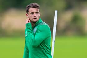 Stephen McGinn takes part in a Hibs training session at East Mains