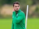 Stephen McGinn takes part in a Hibs training session at East Mains