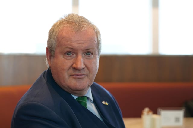 SNP Westminster leader Ian Blackford was seen waiting at Heathrow Airport, London, to meet with the group of orphans who were travelling from Poland. Photo: Steve Parsons/PA Wire