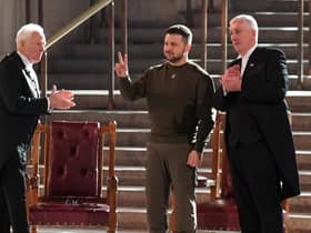 Ukrainian President Volodymyr Zelensky gives a V-for-Victory sign, in the style of Winston Churchill, after addressing politicians in Westminster Hall (Picture: Stefan Rousseau/PA)