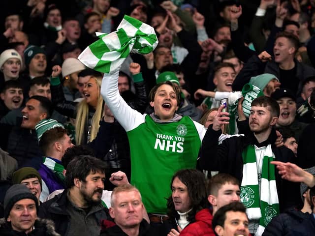 Hibernian fans celebrate during the Premier Sports Cup semi-final match at Ibrox Stadium, Glasgow. They will head to Hampden Park today.