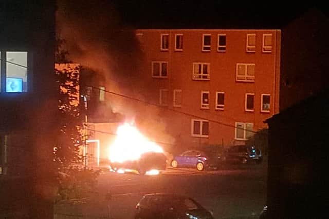 The car was set on fire in Oxgangs Road, Edinburgh picture: Lee Hamilton