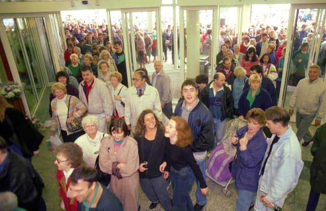 Shoppers pour through the doors on the day the Gyle Shopping Centre officially opened in October 1993.